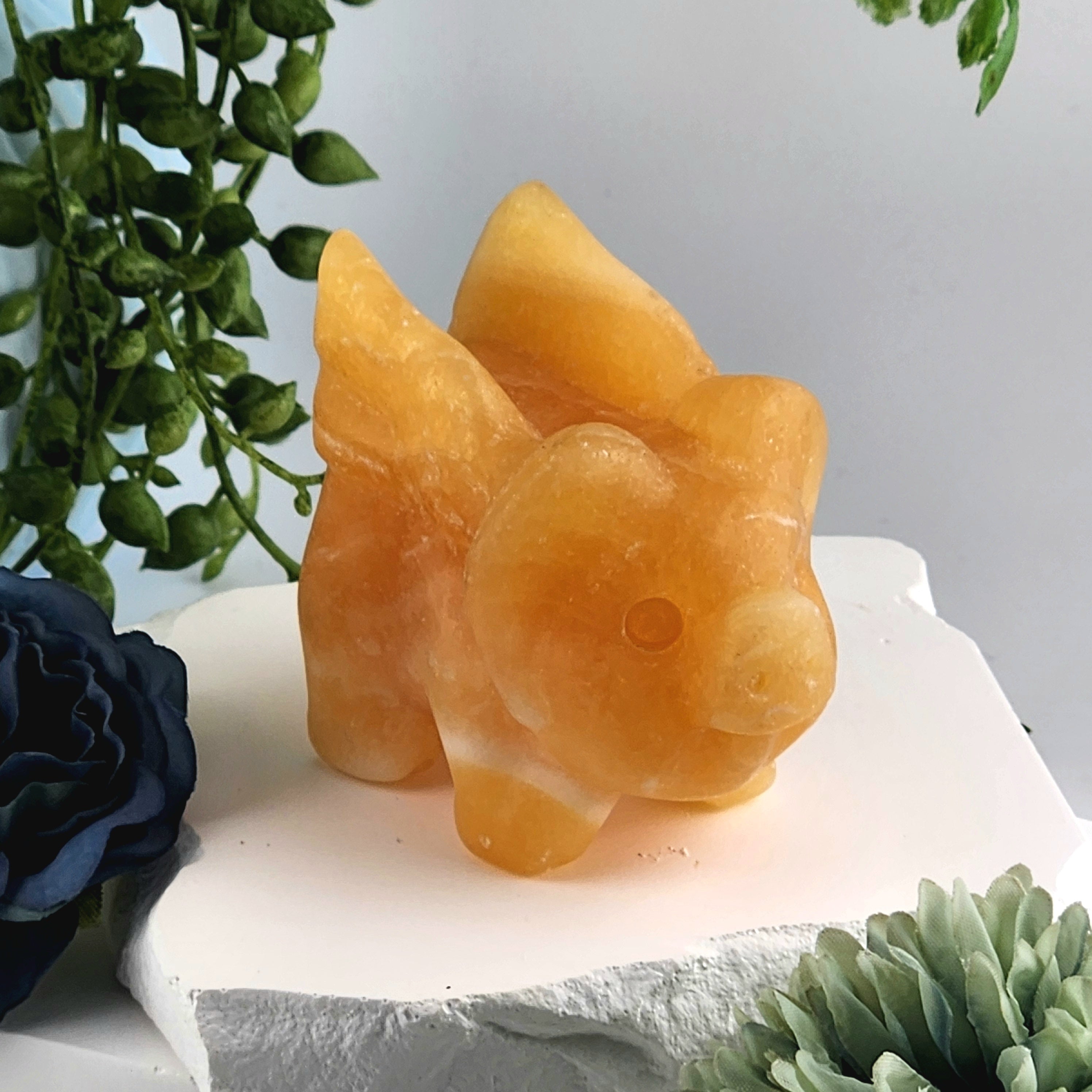 Orange Calcite Flying Pig